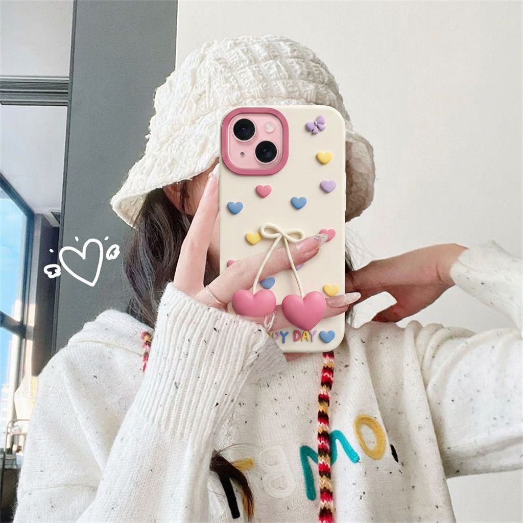 Pastel Heart iPhone case styled with a cream sweater and knitted bucket hat