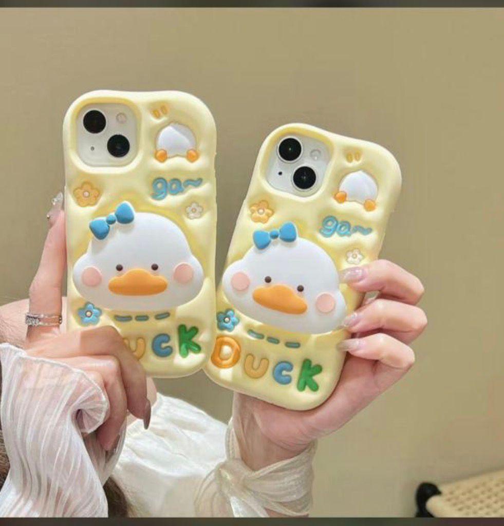 Yellow Sunny Duck iPhone cases with a raised white duck, blue bow, little flowers and colorful DUCK lettering